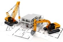 Construction Machinery next to model of house