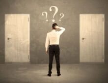 Man choosing which door to enter - How to choose a company to work for - myprojectlessons.com